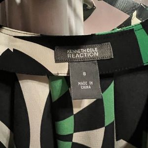 Very pretty patterned Kenneth Cole blouse polyester and spandex mix sz 8